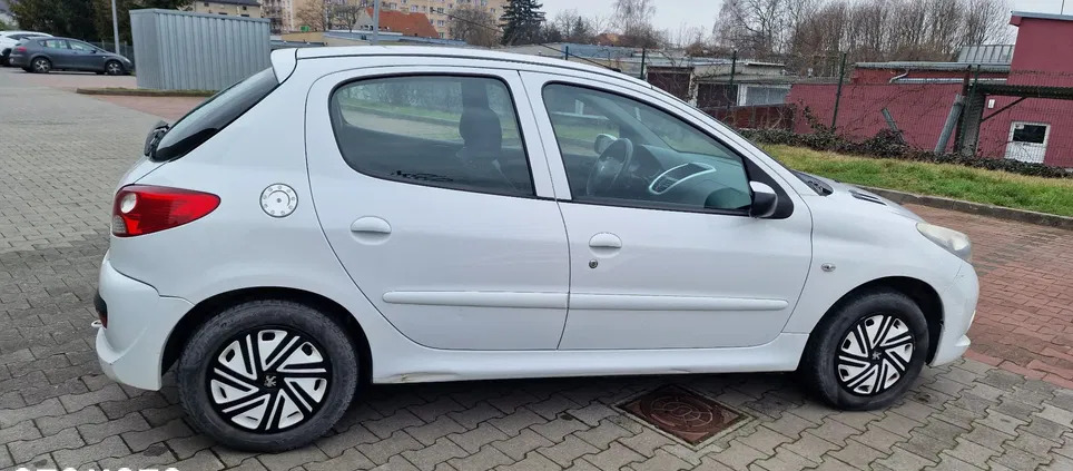 mszana dolna Peugeot 206 plus cena 6500 przebieg: 119957, rok produkcji 2009 z Mszana Dolna